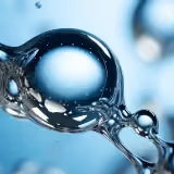 Glassy blue bead symbolizing hydroxyapatite